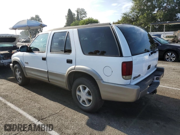 2000 Oldsmobile Bravada z VIN 1GHDT13W7Y2351268, wystawiony jako Copart lot #66408824 z przebiegiem 134 512 mil mil oraz Tytuł czysty. Historia ofert i sprzedaży dostępna na DreamBid. Obrazek 2.