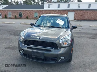 2014 MINI Countryman S with VIN WMWZC3C58EWP27041, listed as a IAAI auction lot 42082489 with 77,749 mi miles and . Bid and sale history available at DreamBid. Image 6.