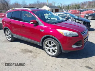 2014 Ford Escape Titanium with VIN 1FMCU9J91EUD72347, listed as a IAAI auction lot 41991180 with 125,198 mi miles. Bid and sale history available at carsss.com. Image 1.