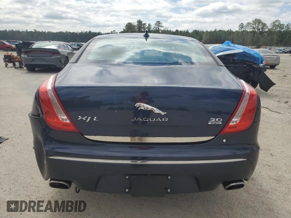 2015 Jaguar XJ Portfolio with VIN SAJWJ2GD8F8V84252, listed as a Copart auction lot 49313935 with 90,545 mi miles and Salvage title. Bid and sale history available at DreamBid. Image 6.