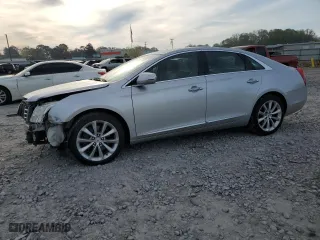 2014 Cadillac XTS Luxury with VIN 2G61M5S39E9118593, listed as a Copart auction lot 50868565 with 179,065 mi miles and Salvage Title. Bid and sale history available at carsss.com. Image 1.