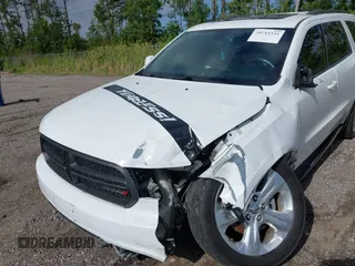 2015 Dodge Durango Limited with VIN 1C4RDJDGXFC947109, listed as a IAAI auction lot 39715331 with 152,655 mi miles and . Bid and sale history available at carsss.com. Image 17.