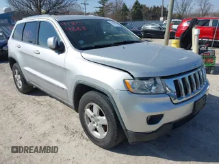 2011 Jeep Grand Cherokee Laredo with VIN 1J4RR4GG3BC589578, listed as a IAAI auction lot 41804883 with 113,016 mi miles. Bid and sale history available at carsss.com. Image 1.