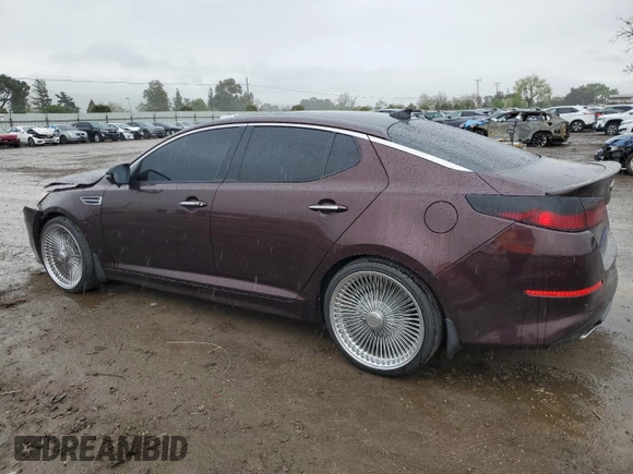 2014 Kia Optima EX with VIN 5XXGN4A79EG329448, listed as a Copart auction lot 50991095 with 103,879 mi miles and Salvage Title. Bid and sale history available at carsss.com. Image 2.