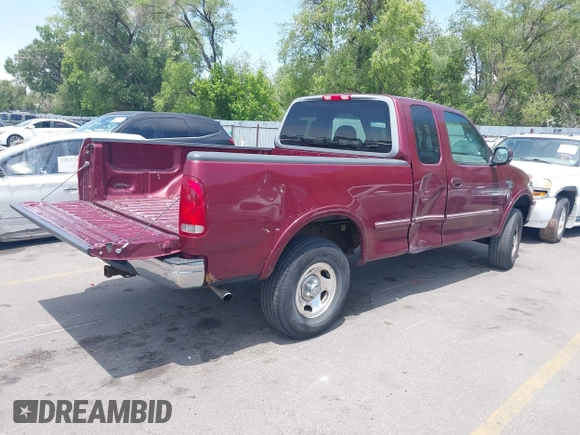 1998 Ford F-150 with VIN 1FTZX18W9WKC09638, listed as a IAAI auction lot 42576838 with 140,714 mi miles and . Bid and sale history available at DreamBid. Image 4.
