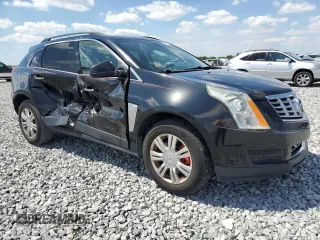 2014 Cadillac SRX with VIN 3GYFNAE38ES572951, listed as a Copart auction lot 53033685 with 104,204 mi miles and Salvage Title. Bid and sale history available at DreamBid. Image 4.