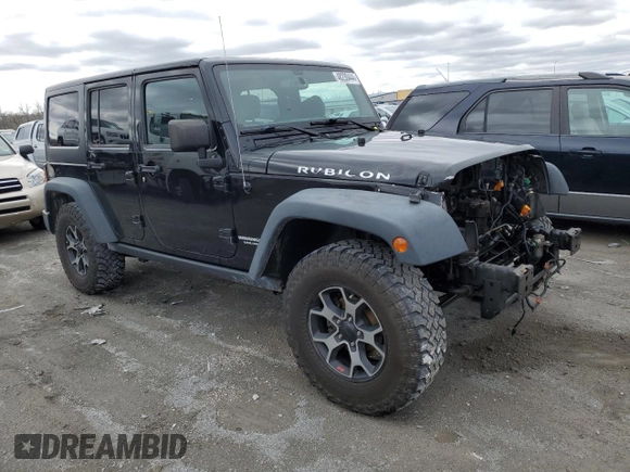 2016 Jeep Wrangler Unlimited Rubicon Hard Rock with VIN 1C4BJWFG9GL155037, listed as a Copart auction lot 48230444 with 138,543 mi miles and Salvage Title. Bid and sale history available at carsss.com. Image 4.