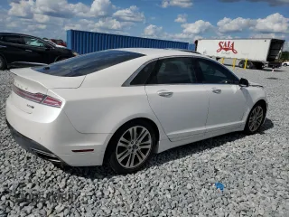 2016 Lincoln MKZ with VIN 3LN6L2J93GR601127, listed as a Copart auction lot 52288765 with 58,871 mi miles and Salvage Title. Bid and sale history available at carsss.com. Image 3.