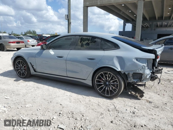 2023 BMW i4 M50 with VIN WBY33AW04PFP53795, listed as a Copart auction lot 42402505 with 20,210 mi miles and Salvage Title. Bid and sale history available at carsss.com. Image 2.