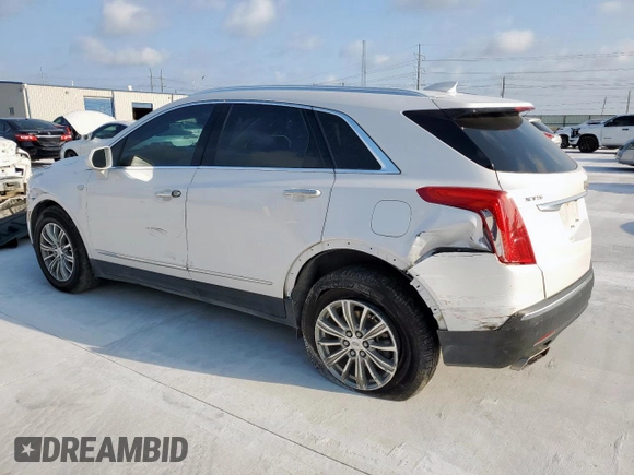 2018 Cadillac XT5 Luxury FWD with VIN 1GYKNCRS7JZ240881, listed as a Copart auction lot 58334075 with 149,014 mi miles and Salvage title. Bid and sale history available at DreamBid. Image 2.