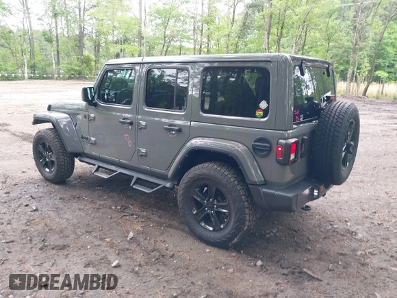2021 Jeep Wrangler Unlimited Sahara with VIN 1C4HJXEG0MW703812, listed as a IAAI auction lot 42186089 with 50,349 mi miles and . Bid and sale history available at DreamBid. Image 3.
