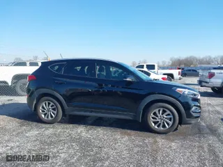 2016 Hyundai Tucson Limited with VIN KM8J33A27GU237225, listed as a IAAI auction lot 41223497 with 158,986 mi miles. Bid and sale history available at carsss.com. Image 13.