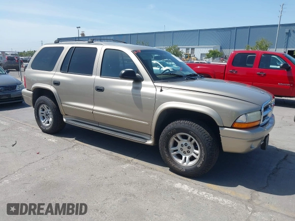 2003 Dodge Durango SLT z VIN 1D4HS48N43F517701, wystawiony jako IAAI lot #42277135 z przebiegiem 135 521 mil mil oraz . Historia ofert i sprzedaży dostępna na DreamBid. Obrazek 1.
