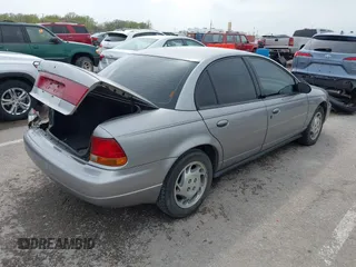 1997 Saturn SL with VIN 1G8ZK527XVZ257477, listed as a IAAI auction lot 42029648 with 114,371 mi miles and . Bid and sale history available at DreamBid. Image 4.