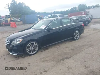 2014 Mercedes-Benz E 350 Sport with VIN WDDHF5KB2EA977354, listed as a IAAI auction lot 42403760 with 92,055 mi miles and . Bid and sale history available at DreamBid. Image 2.