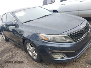 2015 Kia Optima LX with VIN 5XXGM4A70FG486256, listed as a IAAI auction lot 42211318 with 141,515 mi miles and . Bid and sale history available at DreamBid. Image 1.