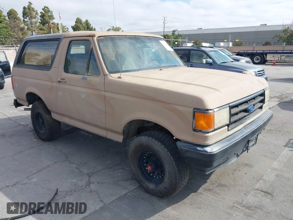 1988 Ford Bronco Eddie Bauer with VIN 1FMEU15N3JLA98943, listed as a IAAI auction lot 42771847 with 41,662 mi miles and . Bid and sale history available at DreamBid. Image 1.