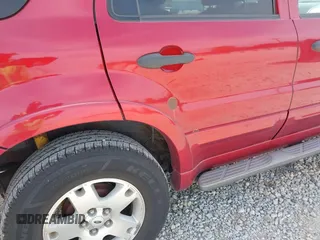 2007 Ford Escape XLT with VIN 1FMYU03117KB44940, listed as a IAAI auction lot 42148846 with 238,871 mi miles. Bid and sale history available at carsss.com. Image 13.