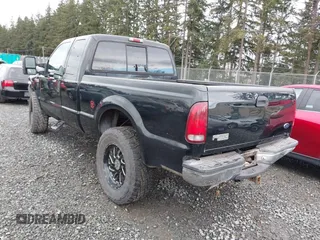 1999 Ford Super Duty F-250 XL with VIN 1FTNX21F2XEC99584, listed as a IAAI auction lot 41611098 with 424,263 mi miles. Bid and sale history available at carsss.com. Image 3.