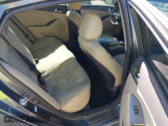 2014 Kia Optima LX with VIN KNAGM4AD7E5065723, listed as a IAAI auction lot 42551879 with 106,206 mi miles and . Bid and sale history available at DreamBid. Image 8.