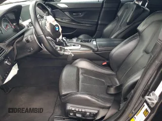 2016 BMW M6 z VIN WBS6E9C59GG437111, wystawiony jako Copart lot #44711734 z przebiegiem 79 471 mil mil oraz . Historia ofert i sprzedaży dostępna na DreamBid. Obrazek 7.