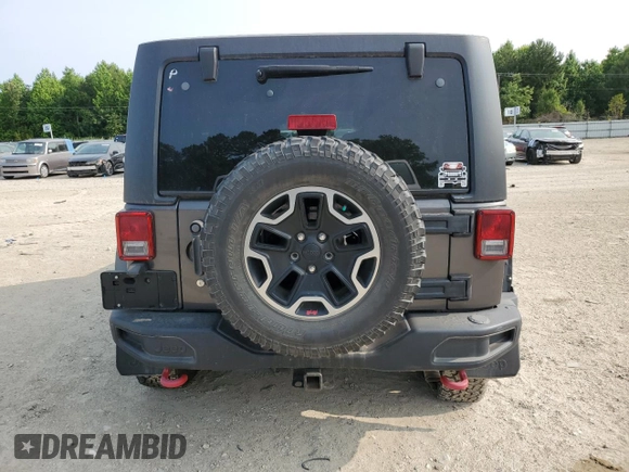 2016 Jeep Wrangler Unlimited Rubicon с VIN 1C4BJWFG1GL183933, выставлен на аукционе Copart как лот 58502105 с пробегом 110 764 миль миль и Списание • Salvage title. История ставок и продаж доступна на DreamBid. Изображение 6.