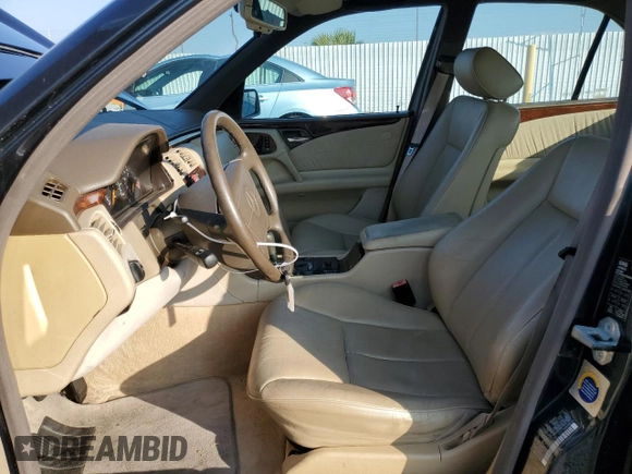 1997 Mercedes-Benz E 320 with VIN WDBJF55FXVA430115, listed as a Copart auction lot 43053715 with 158,057 mi miles and Clean Title. Bid and sale history available at DreamBid. Image 7.