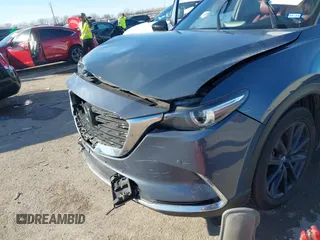 2022 Mazda CX-9 Grand Touring with VIN JM3TCBDYXN0625567, listed as a IAAI auction lot 41327380 with 50,672 mi miles and . Bid and sale history available at DreamBid. Image 6.