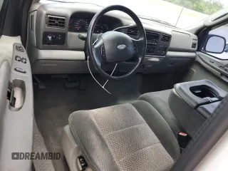 2003 Ford F-250 XL with VIN 1FTNX20L63EB37975, listed as a Copart auction lot 65723935 with 157,377 mi miles and Salvage title. Bid and sale history available at DreamBid. Image 8.