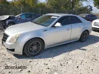 2010 Cadillac CTS Luxury with VIN 1G6DE5EGXA0124772, listed as a Copart auction lot 74450344 with 142,734 mi miles and Salvage title. Bid and sale history available at DreamBid. Image 1.