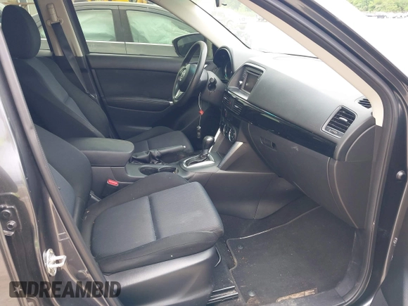 2014 Mazda CX-5 Sport z VIN JM3KE4BE6E0404753, wystawiony jako IAAI lot #42260554 z przebiegiem 144 688 mil mil oraz . Historia ofert i sprzedaży dostępna na DreamBid. Obrazek 5.