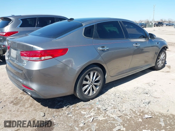 2016 Kia Optima EX with VIN 5XXGU4L31GG106854, listed as a IAAI auction lot 41762052 with 122,121 mi miles. Bid and sale history available at carsss.com. Image 4.