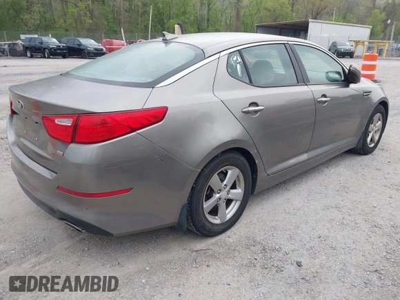 2014 Kia Optima LX with VIN 5XXGM4A73EG277964, listed as a IAAI auction lot 42079663 with 91,009 mi miles. Bid and sale history available at carsss.com. Image 4.