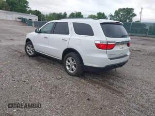 2013 Dodge Durango Crew with VIN 1C4RDJDGXDC693933, listed as a IAAI auction lot 42201796 with 169,051 mi miles and . Bid and sale history available at DreamBid. Image 3.