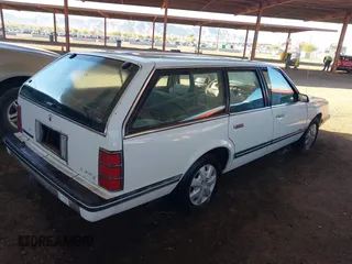 1989 Chevrolet Celebrity z VIN 1G1AW81W1K6142189, wystawiony jako IAAI lot #41816143 z przebiegiem 141 081 mil mil oraz . Historia ofert i sprzedaży dostępna na DreamBid. Obrazek 4.