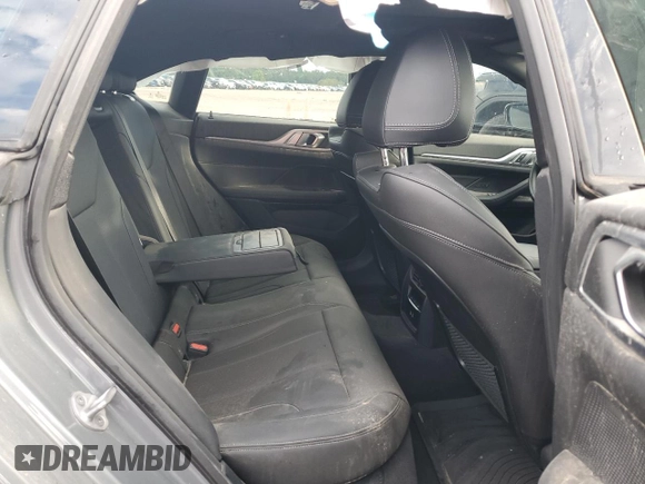 2023 BMW i4 eDrive35 z VIN WBY43AW02PFP44405, wystawiony jako Copart lot #56287965 z przebiegiem 18 085 mil mil oraz Czysty tytuł • Clean title. Historia ofert i sprzedaży dostępna na DreamBid. Obrazek 10.