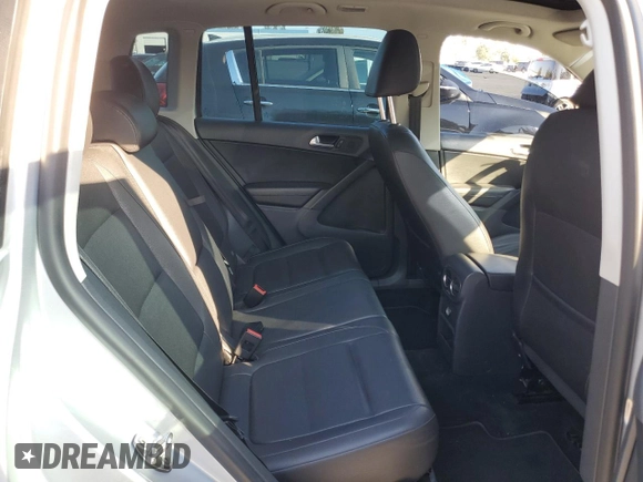 2013 Volkswagen Tiguan S with VIN WVGAV7AX8DW501081, listed as a Copart auction lot 88065365 with 157,312 mi miles and Salvage title. Bid and sale history available at DreamBid. Image 10.