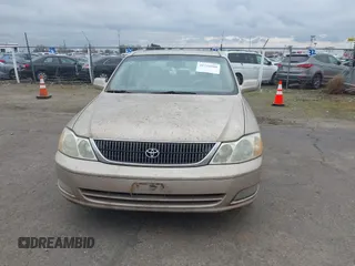 2001 Toyota Avalon XL w/Bucket Seats with VIN 4T1BF28B91U173868, listed as a IAAI auction lot 41721904 with 325,097 mi miles. Bid and sale history available at carsss.com. Image 12.