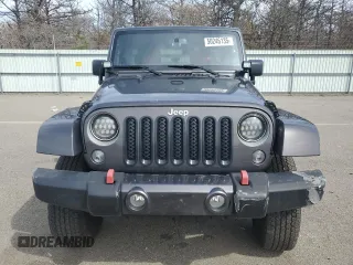 2018 Jeep Wrangler Unlimited Sahara with VIN 1C4BJWEG7JL856331, listed as a Copart auction lot 50246135 with 101,014 mi miles and Salvage title. Bid and sale history available at DreamBid. Image 5.