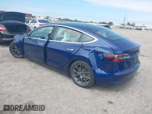 2020 Tesla Model 3 Standard Range Plus with VIN 5YJ3E1EA7LF785838, listed as a IAAI auction lot 41586081 with 38,392 mi miles and . Bid and sale history available at carsss.com. Image 3.