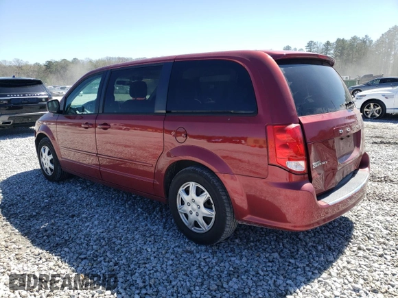 2014 Dodge Grand Caravan American Value with VIN 2C4RDGBG3ER323793, listed as a Copart auction lot 49095945 with 102,129 mi miles and Salvage Title. Bid and sale history available at DreamBid. Image 2.