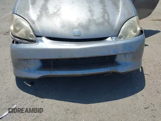 2000 Honda Insight z VIN JHMZE1357YT003654, wystawiony jako IAAI lot #42428076 z przebiegiem 173 445 mil mil oraz . Historia ofert i sprzedaży dostępna na DreamBid. Obrazek 6.