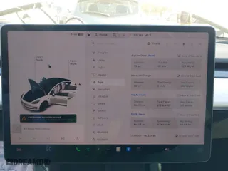 2022 Tesla Model 3 with VIN 5YJ3E1EA5NF111173, listed as a IAAI auction lot 41030634 with 99,337 mi miles. Bid and sale history available at carsss.com. Image 7.