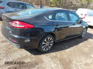 2020 Ford Fusion SE с VIN 3FA6P0T96LR180613, выставлен на аукционе IAAI как лот 42216435 с пробегом 52 904 миль миль и . История ставок и продаж доступна на DreamBid. Изображение 4.