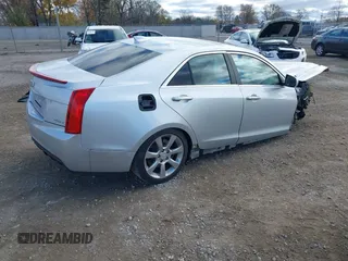2015 Cadillac ATS Luxury RWD z VIN 1G6AB5RXXF0123831, wystawiony jako IAAI lot #40754245 z przebiegiem Nie podano mil oraz . Historia ofert i sprzedaży dostępna na DreamBid. Obrazek 4.