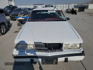 1993 Dodge Dynasty z VIN 1B3XC4632PD153627, wystawiony jako Copart lot #75645834 z przebiegiem 199 336 mil mil oraz Szkoda całkowita • Salvage title. Historia ofert i sprzedaży dostępna na DreamBid. Obrazek 5.