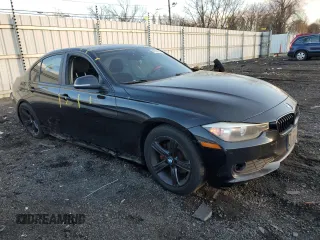 2014 BMW 3 Series 320i xDrive with VIN WBA3C3C56EF984060, listed as a Copart auction lot 88330235 with 233,559 mi miles and Salvage Title. Bid and sale history available at carsss.com. Image 4.