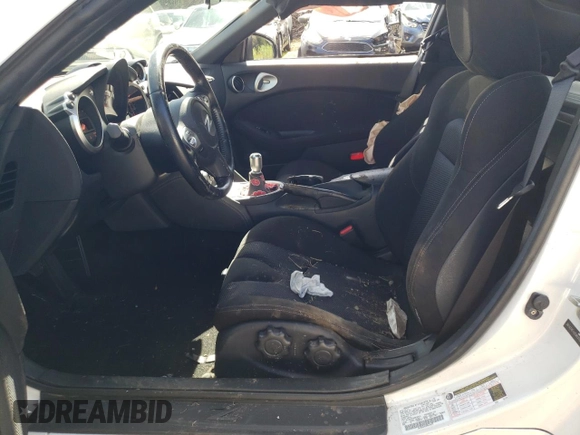 2014 Nissan 370Z Nismo with VIN JN1AZ4EH2EM630833, listed as a Copart auction lot 81773274 with 38,051 mi miles and Salvage Title. Bid and sale history available at DreamBid. Image 7.