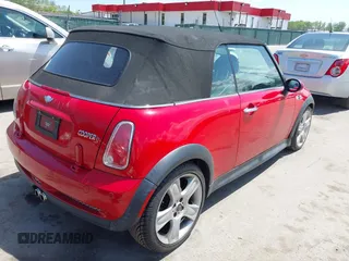 2006 MINI Convertible S with VIN WMWRH33586TK59381, listed as a IAAI auction lot 42165953 with 94,109 mi miles and . Bid and sale history available at DreamBid. Image 4.