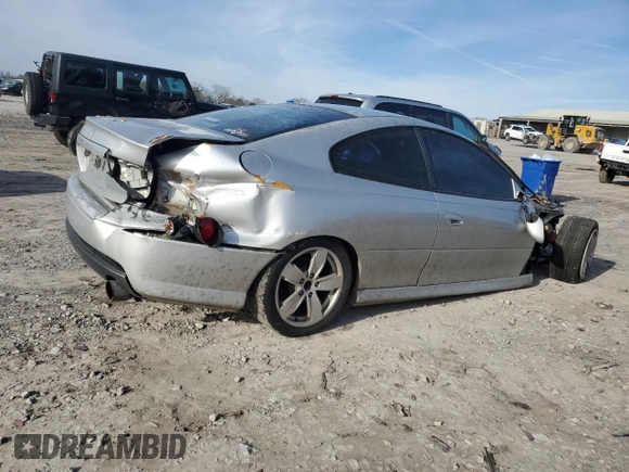 2005 Pontiac GTO z VIN 6G2VX12UX5L381201, wystawiony jako Copart lot #45473085 z przebiegiem 148 787 mil mil oraz Szkoda całkowita • Salvage title. Historia ofert i sprzedaży dostępna na DreamBid. Obrazek 3.